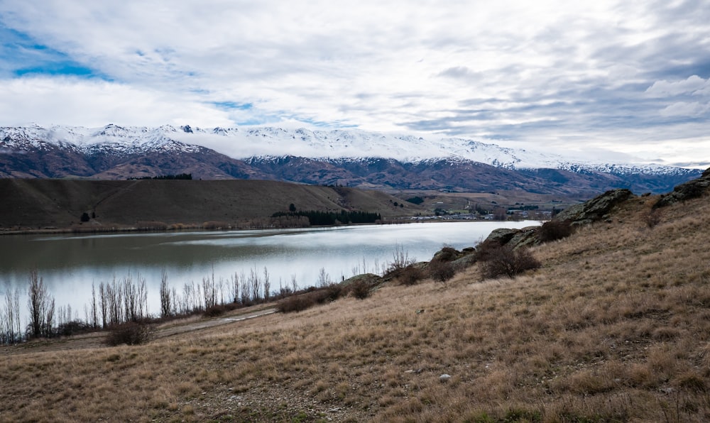 a lake surrounded by mountains