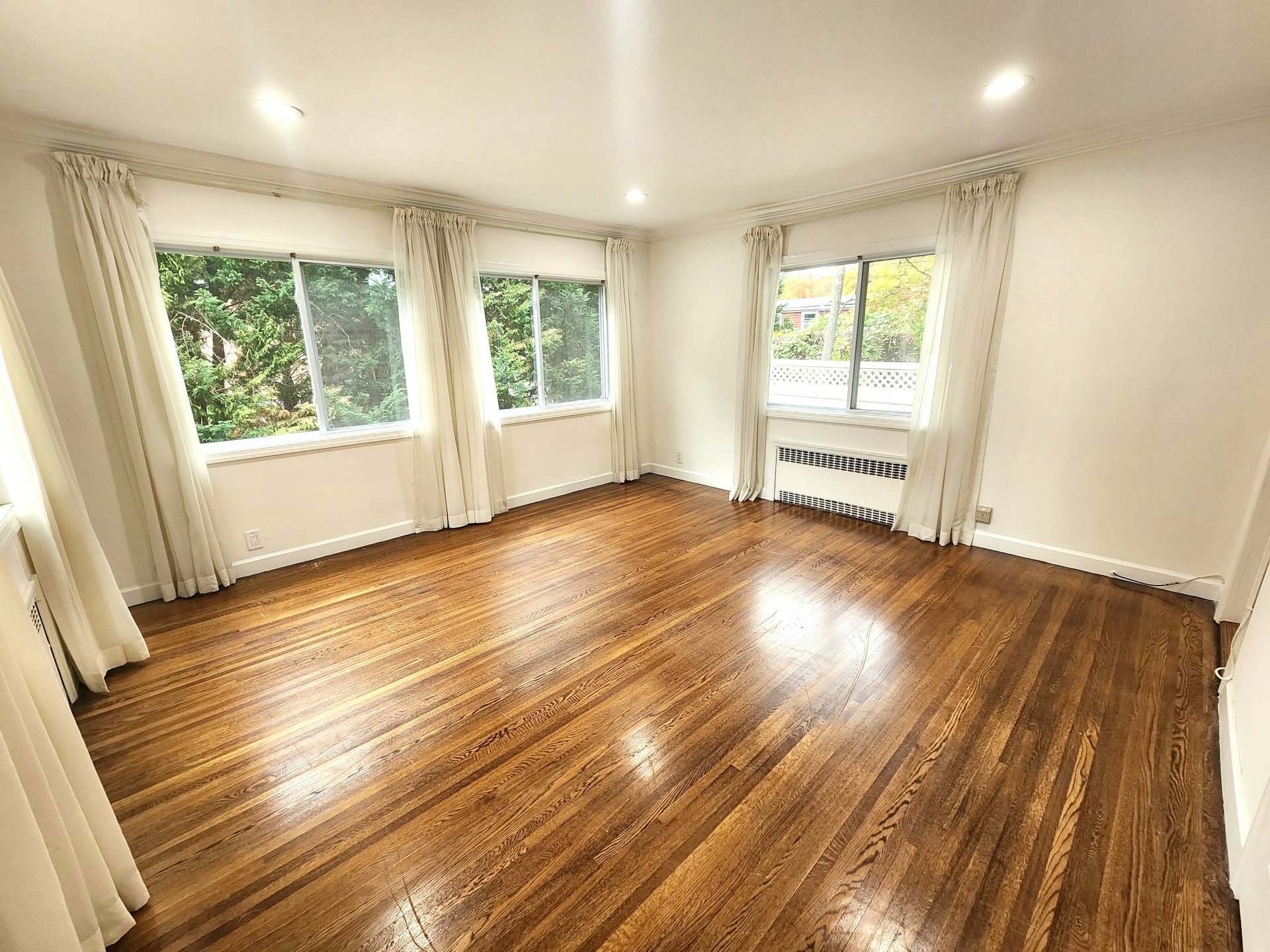 woman wearing yellow long-sleeved dress under white clouds and blue sky during daytime