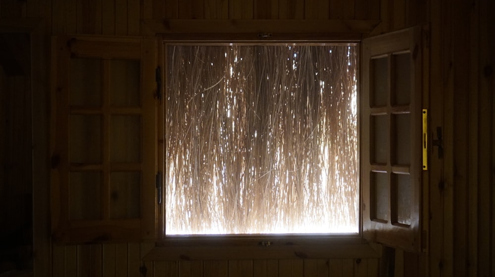 a window with a view of a snowy landscape