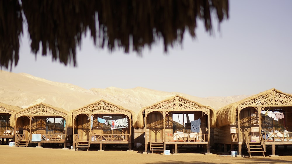 a group of straw huts