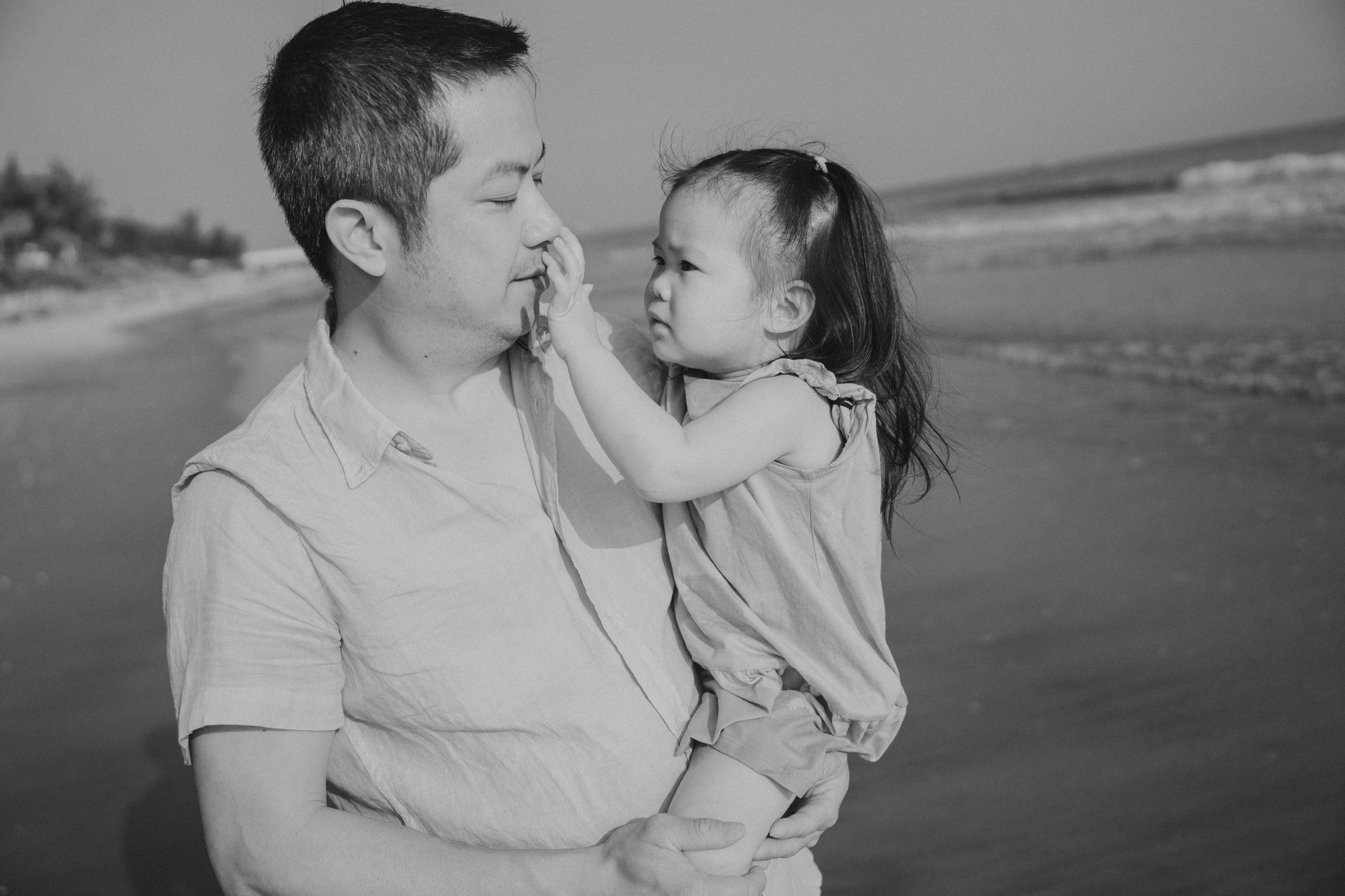 a person holding a child