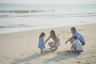 a group of people on a beach
