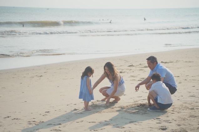 a group of people on a beach
