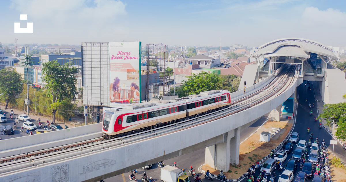 Pleng Train Bridge Java A train on a bridge photo – Free Blok m Image on Unsplash