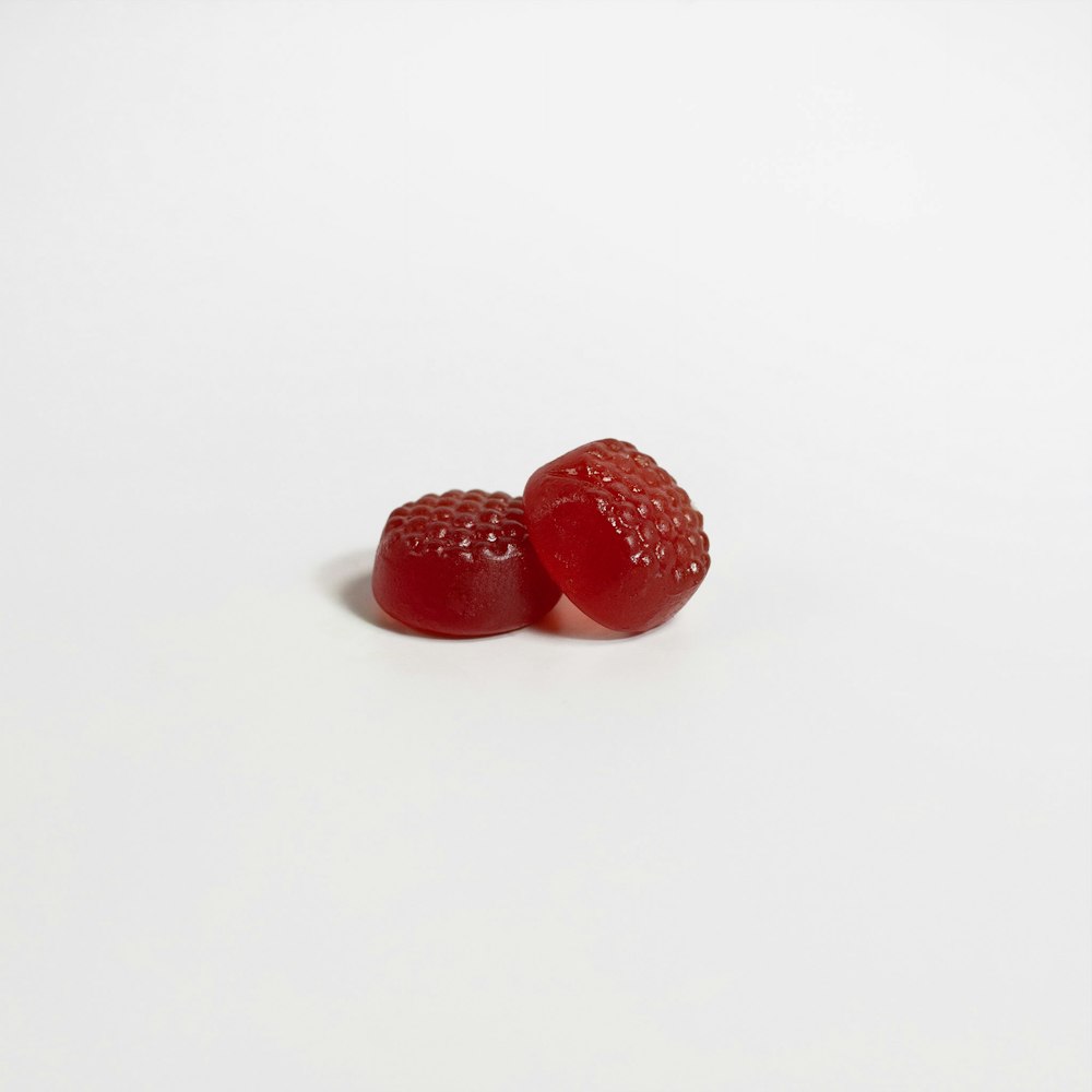 a group of red raspberries