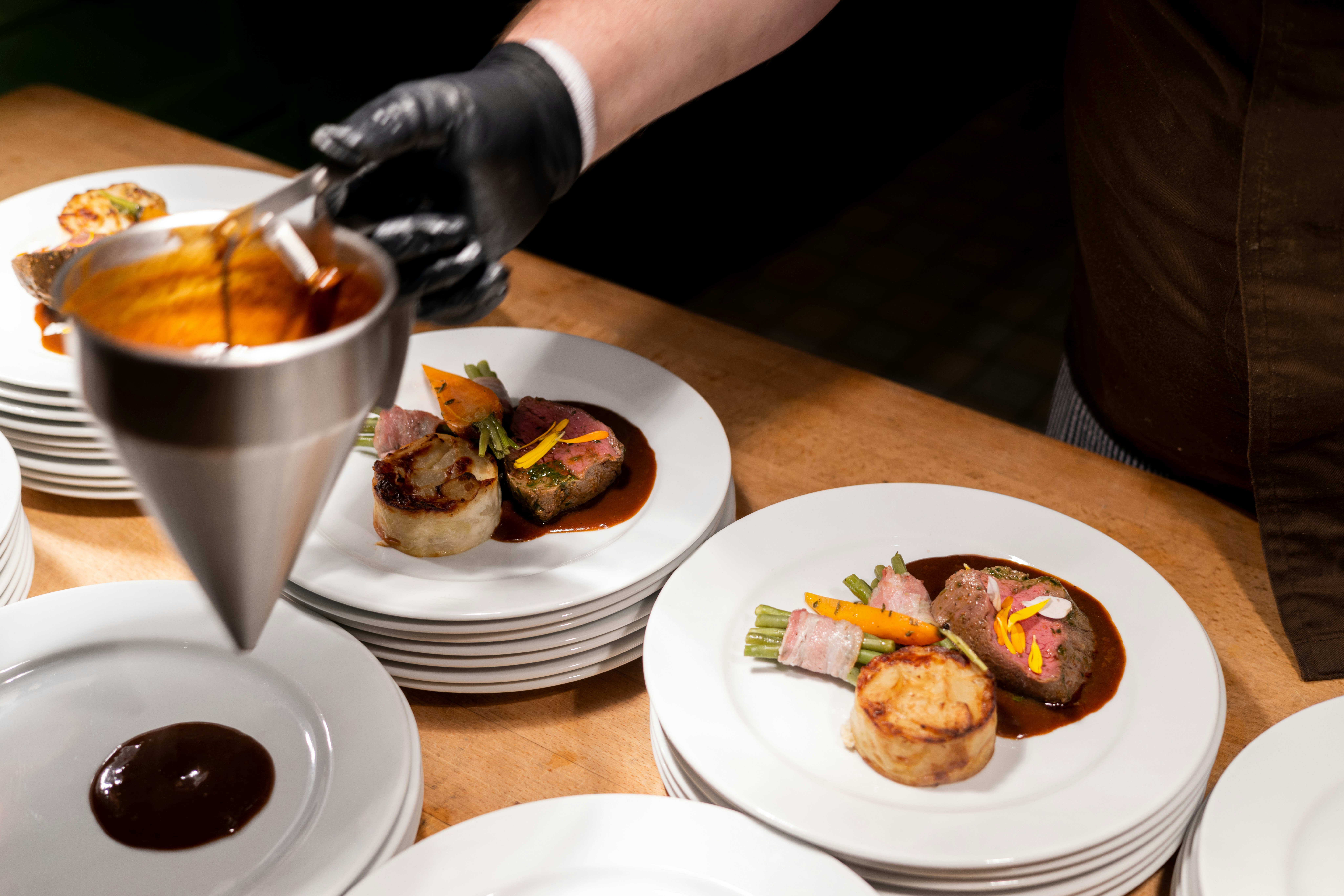 A spread of beautifully plated tasting menu dishes