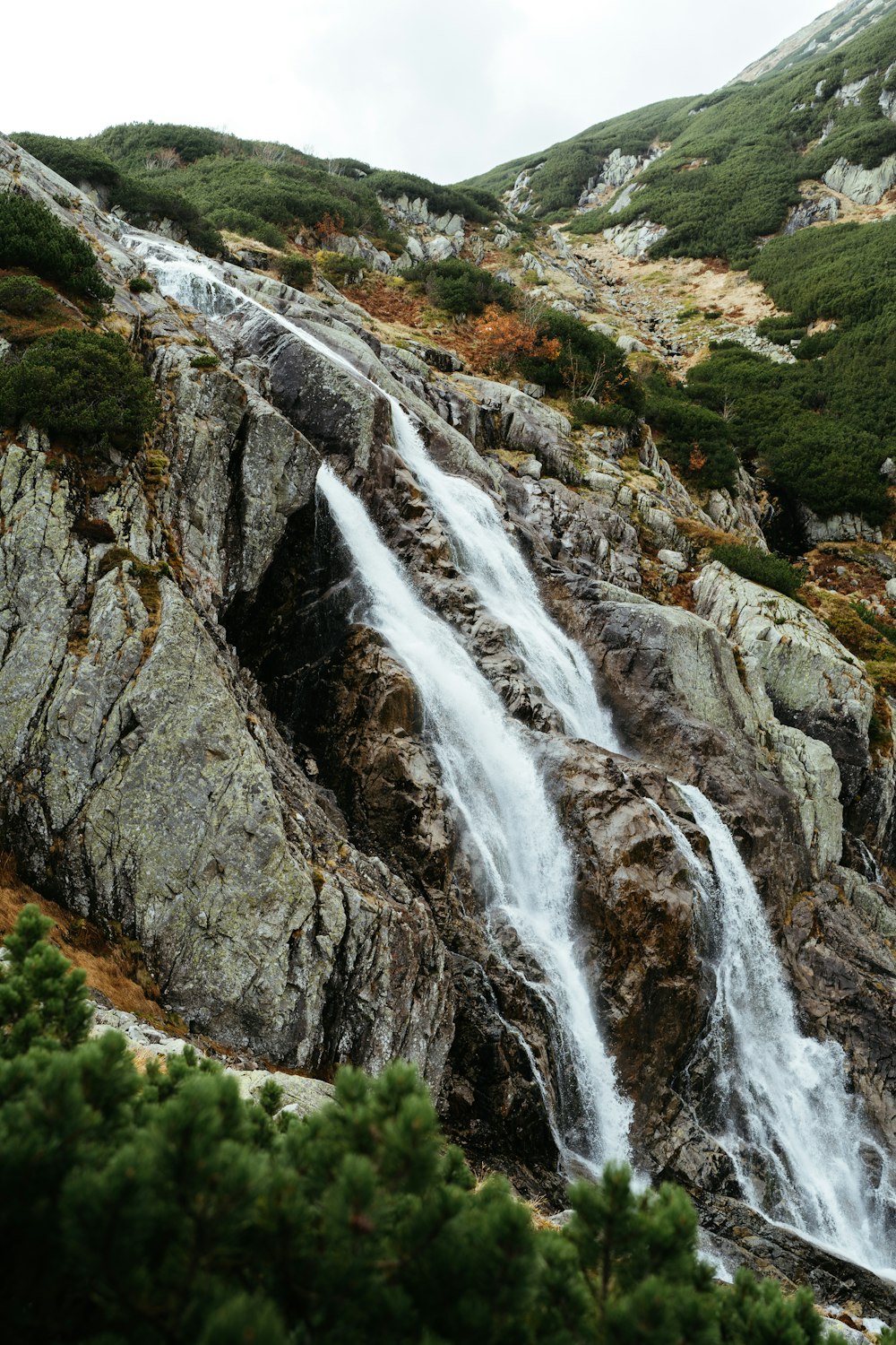 a waterfall in a rocky area