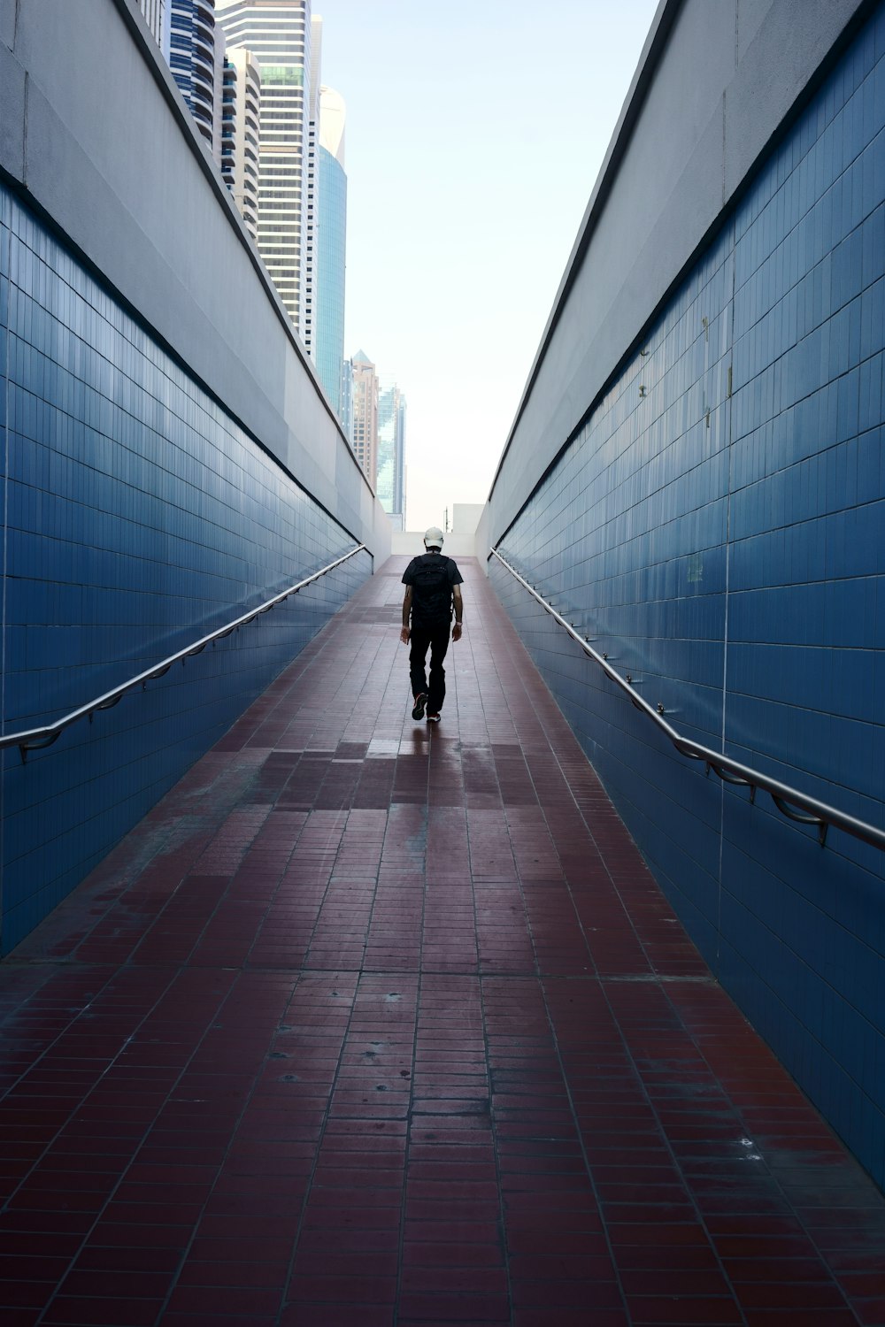 a person walking on a bridge