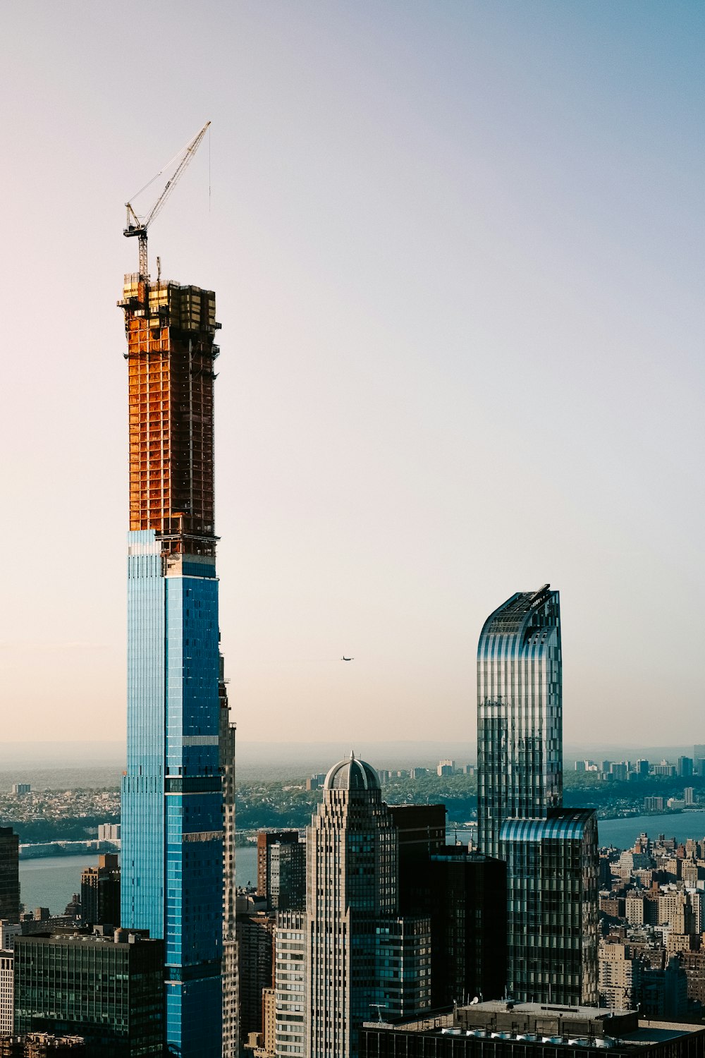 a tall building with a crane