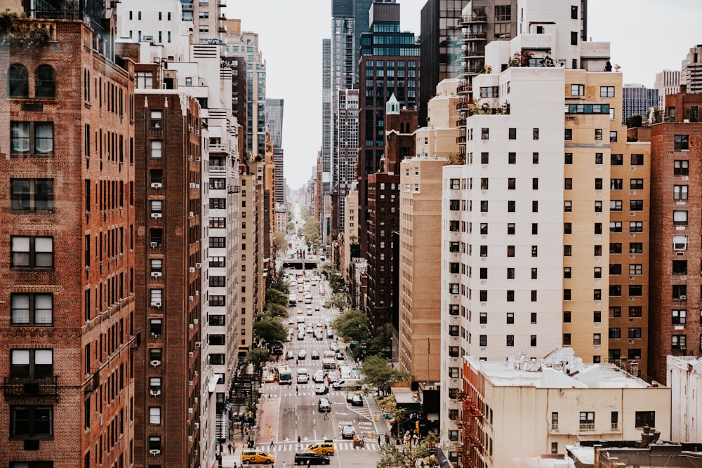 a city street with tall buildings