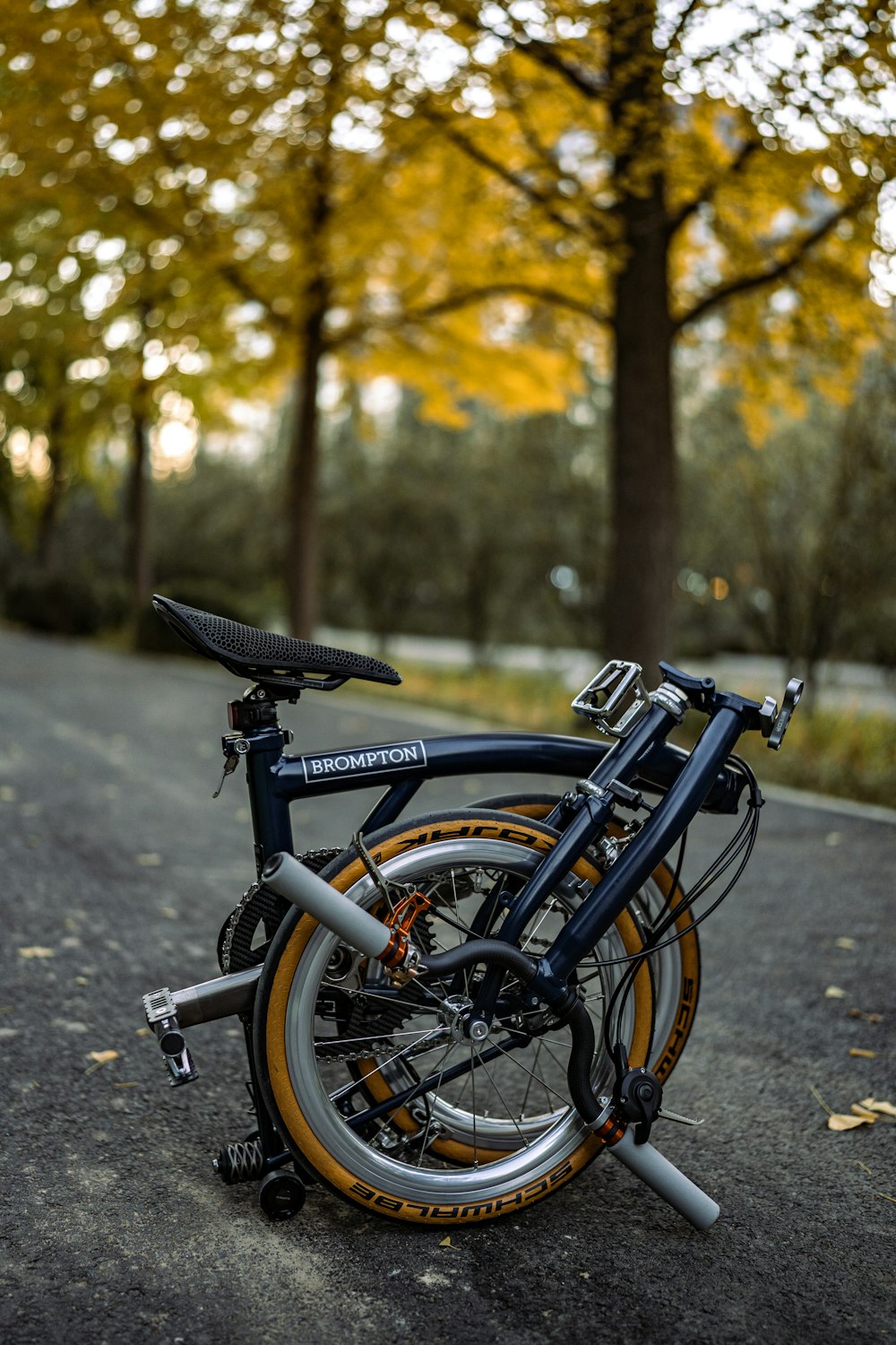 a bicycle parked on a sidewalk