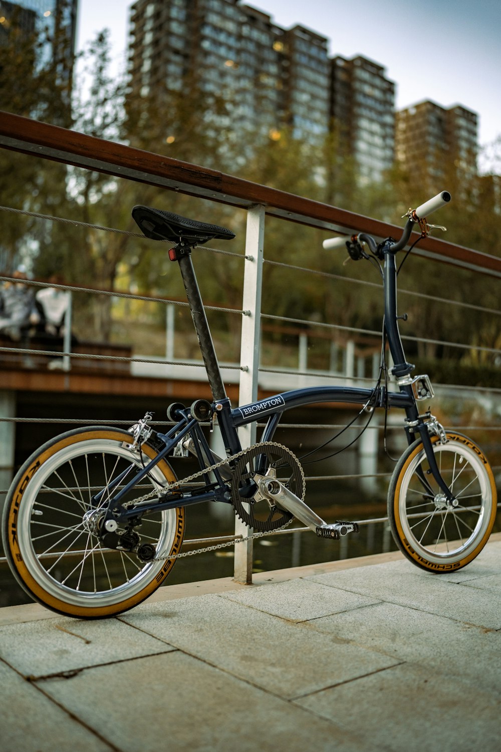 a bicycle parked on a railing