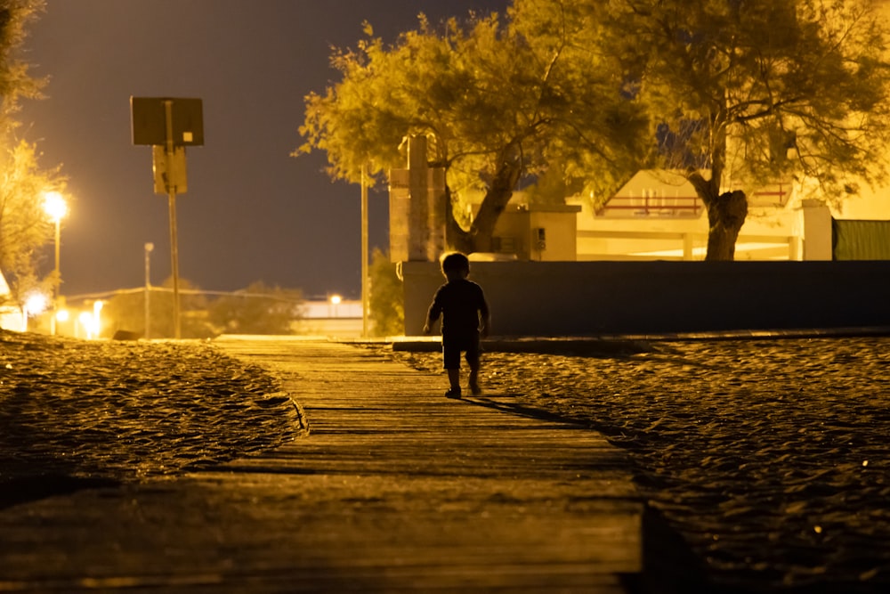 a person walking on a sidewalk