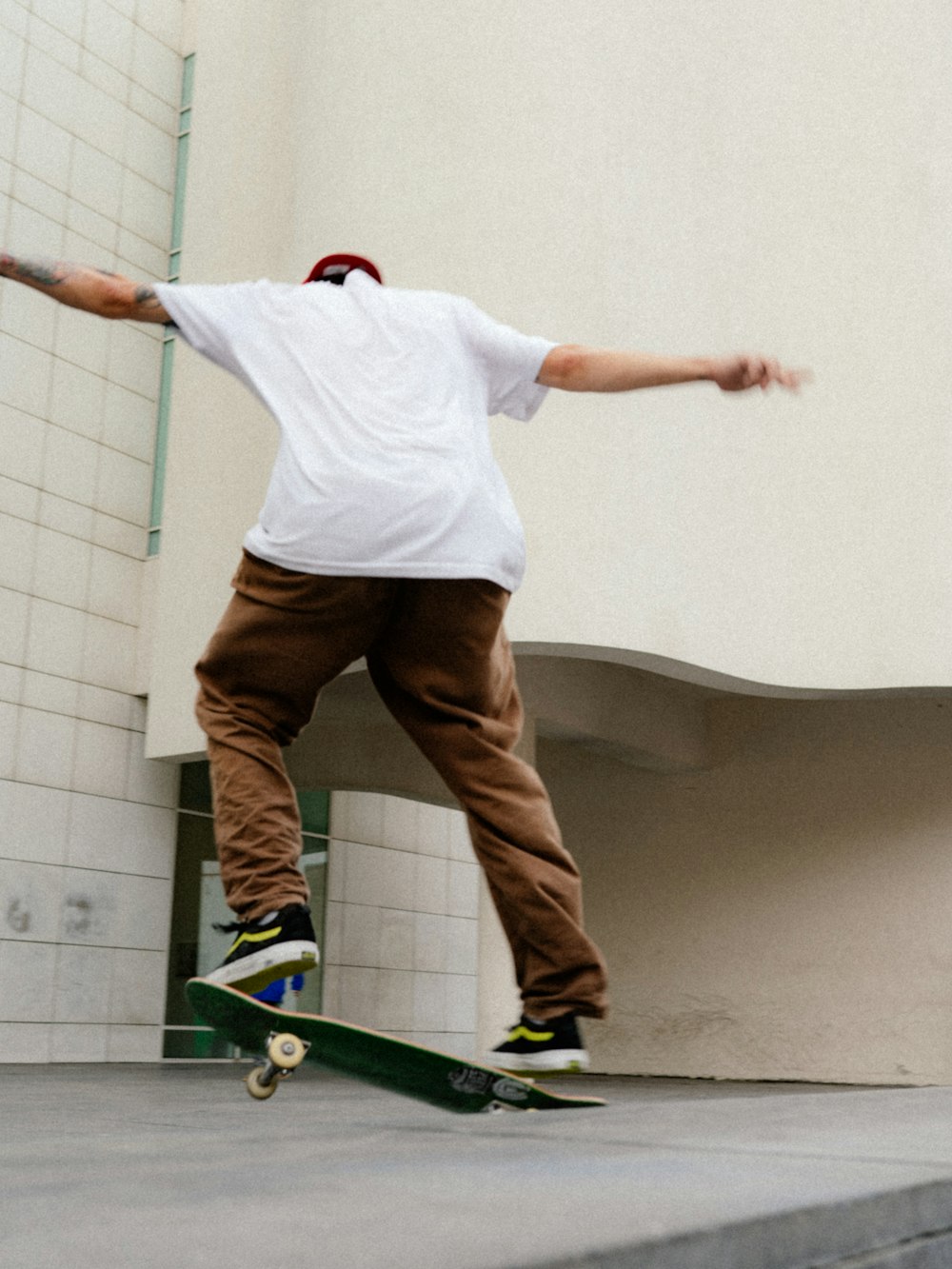 a man doing a trick on a skateboard