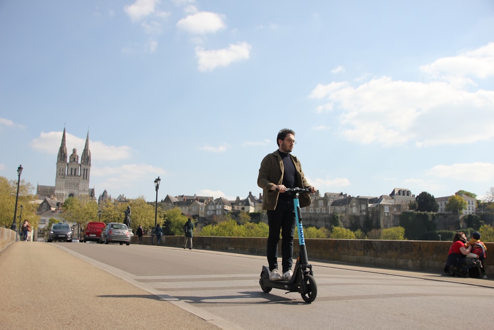 a man riding a scooter