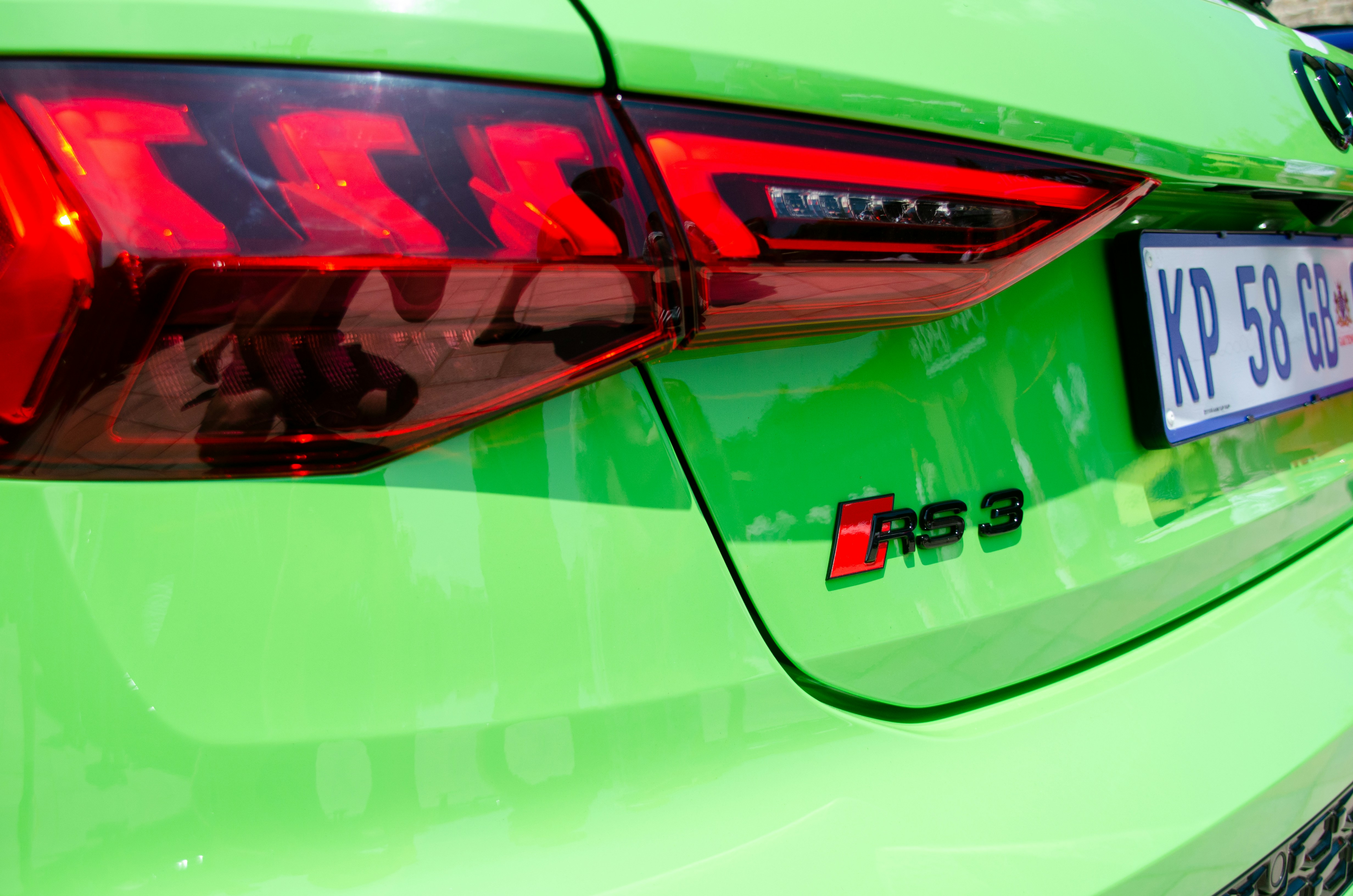 the back of a green car