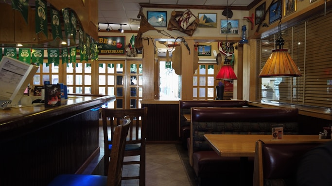 Cozy restaurant entrance with warm lighting and ocean-themed decor