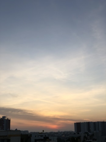 A sunset view over the holy city with gentle blue hues blending into the sky.