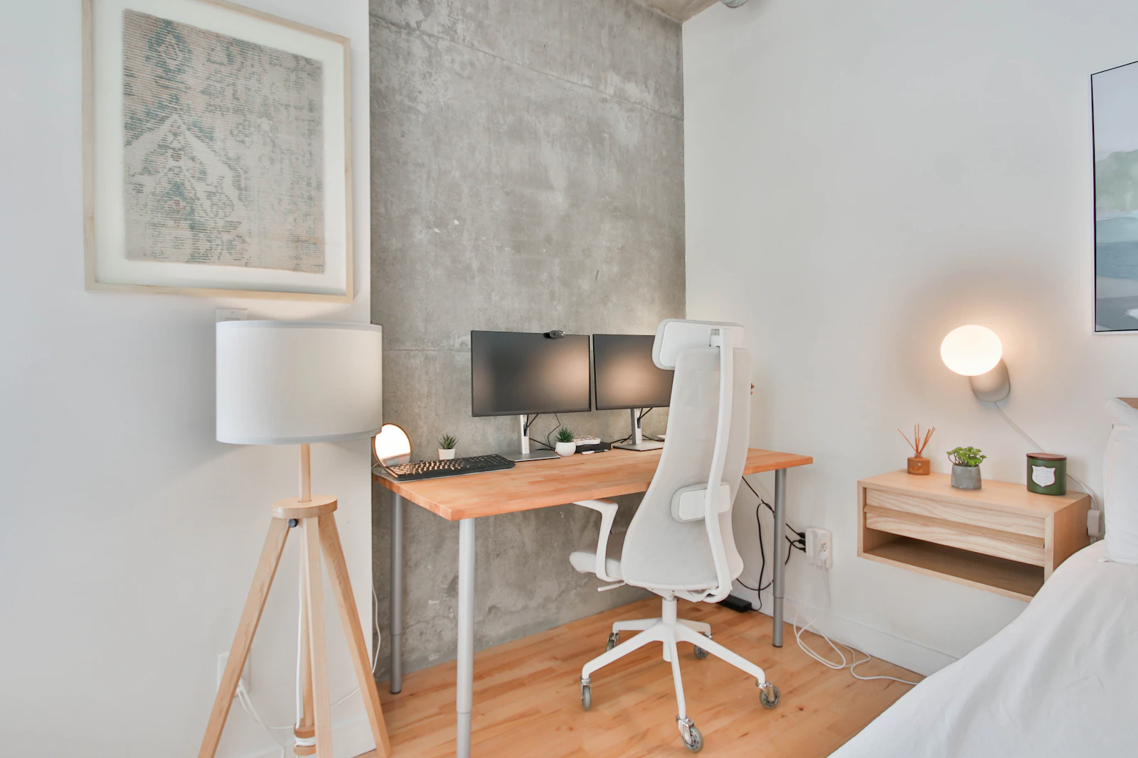 A quiet studio room with a desk and chair