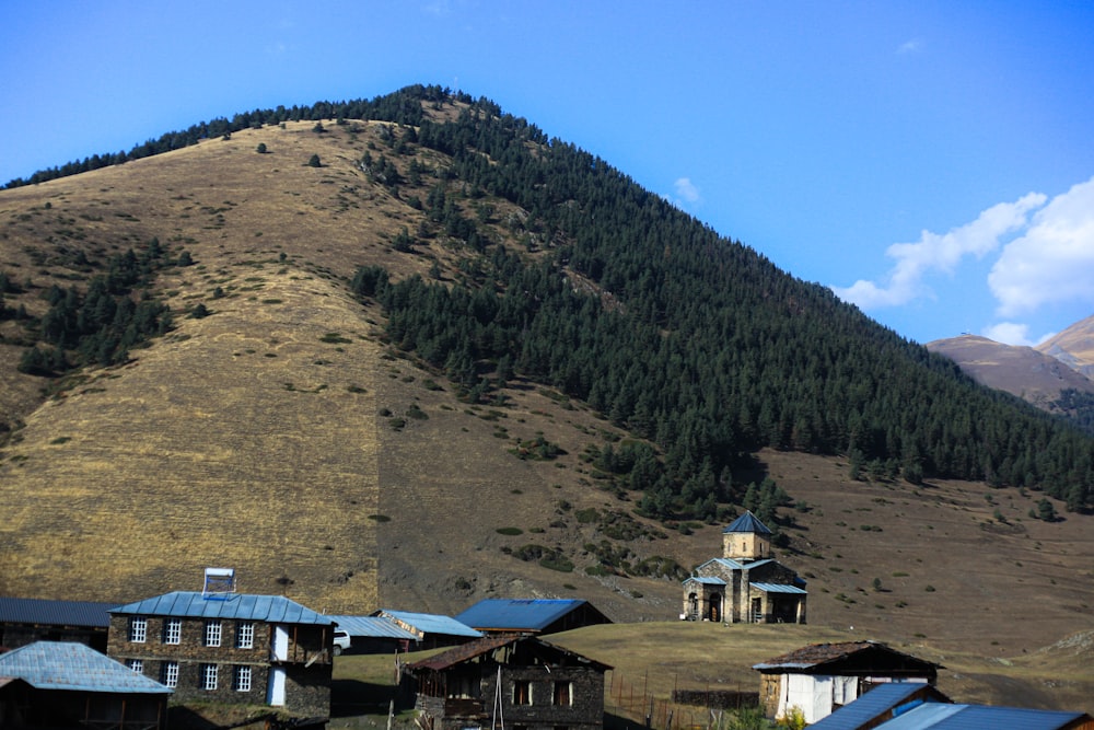 a group of buildings on a hill