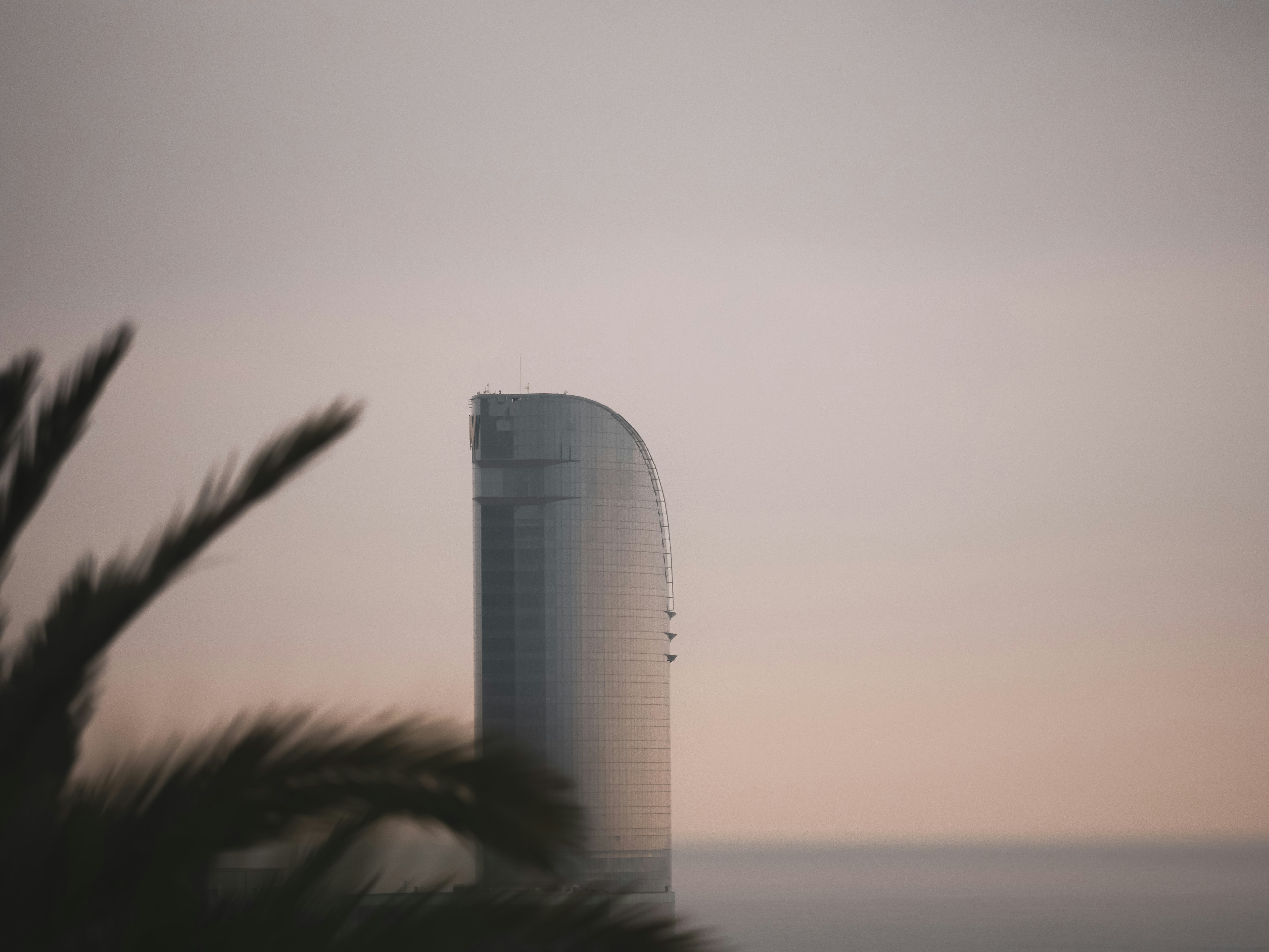 A tall building by the water