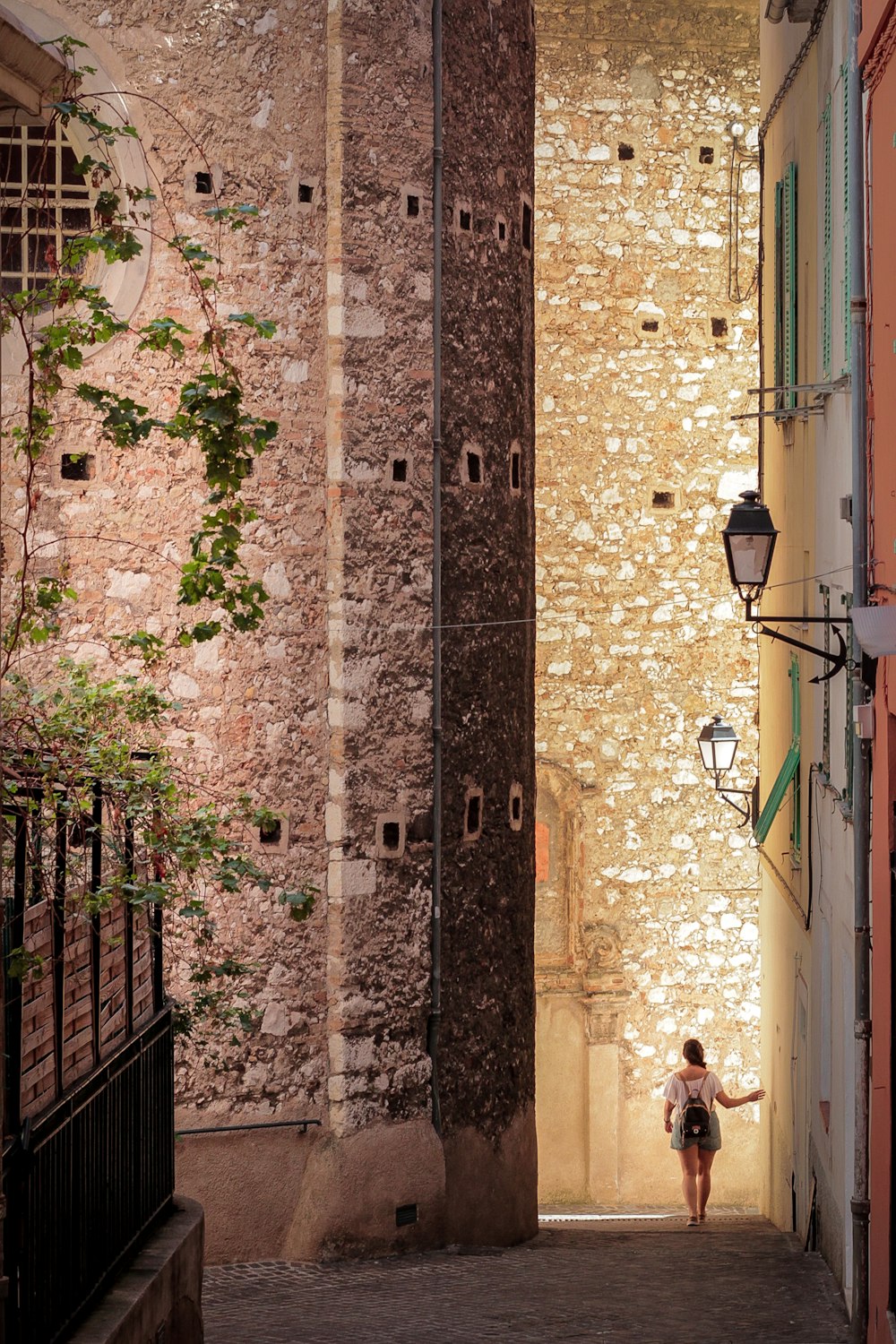 a person walking on a sidewalk