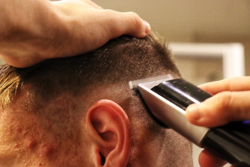 a man getting his haircut