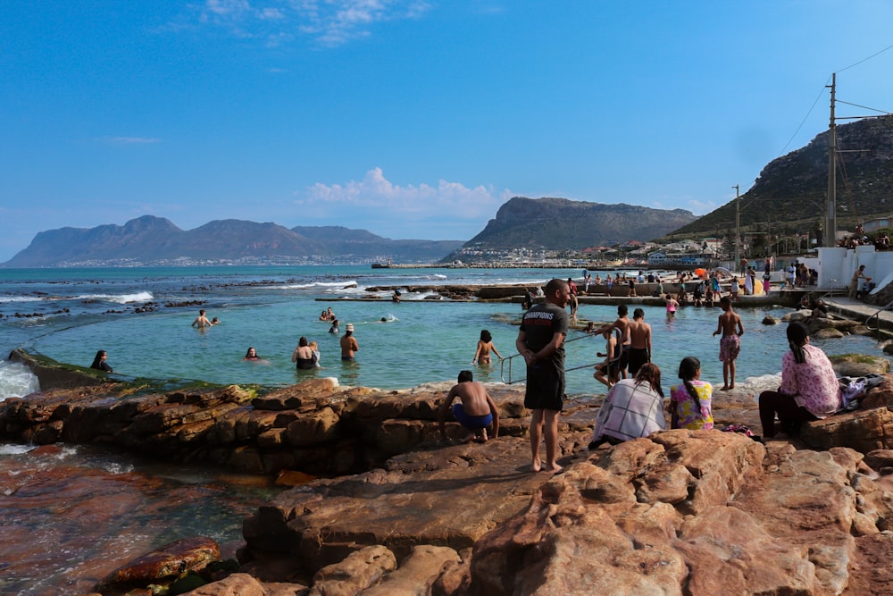 a group of people at a beach