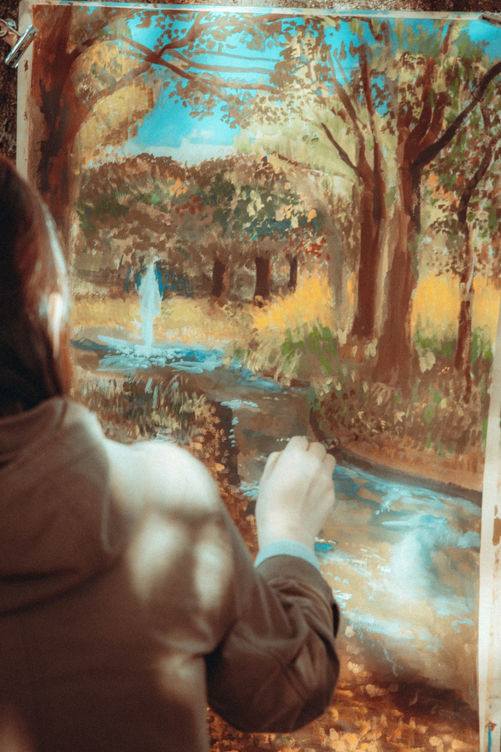 a person painting a picture