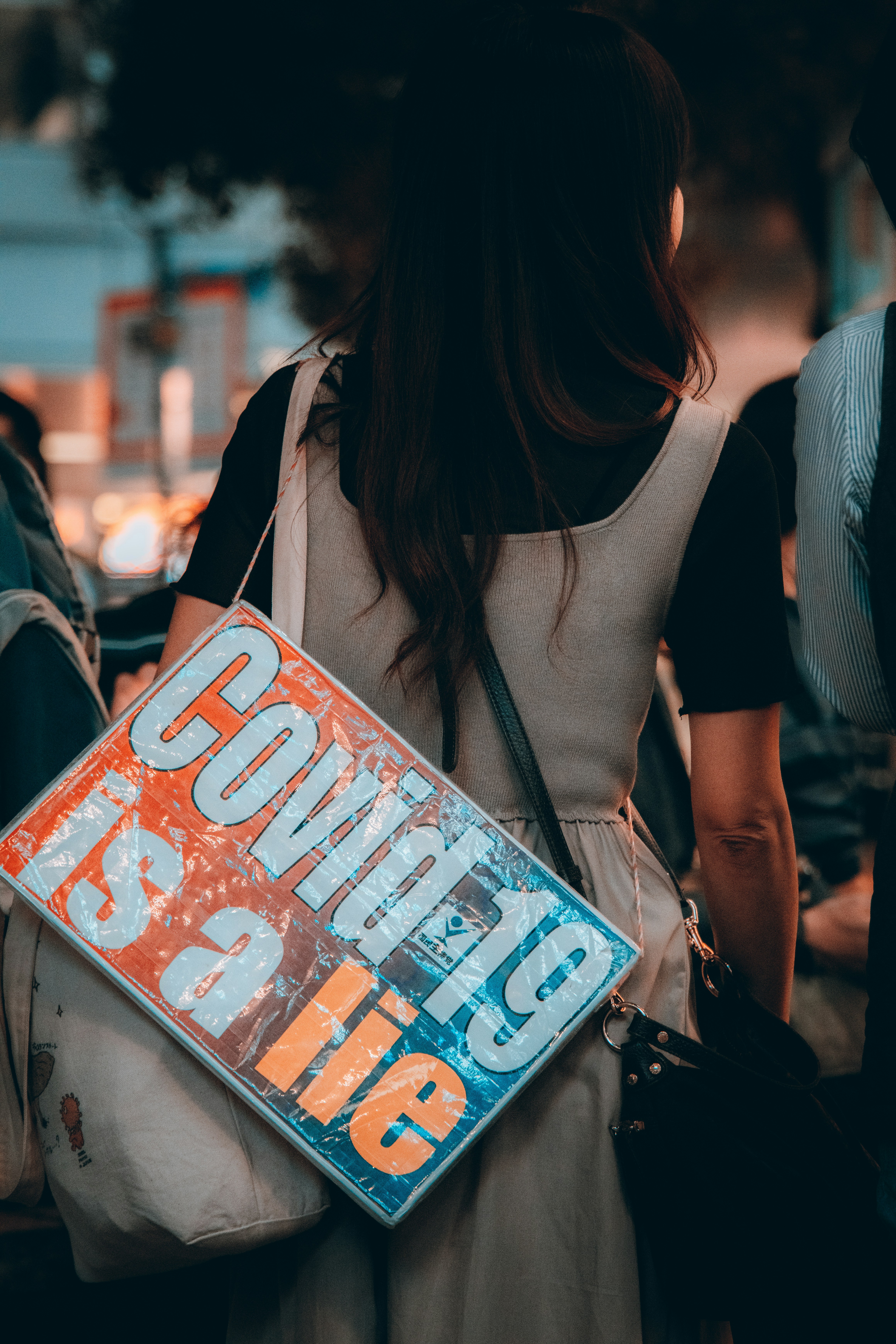 a person carrying a bag