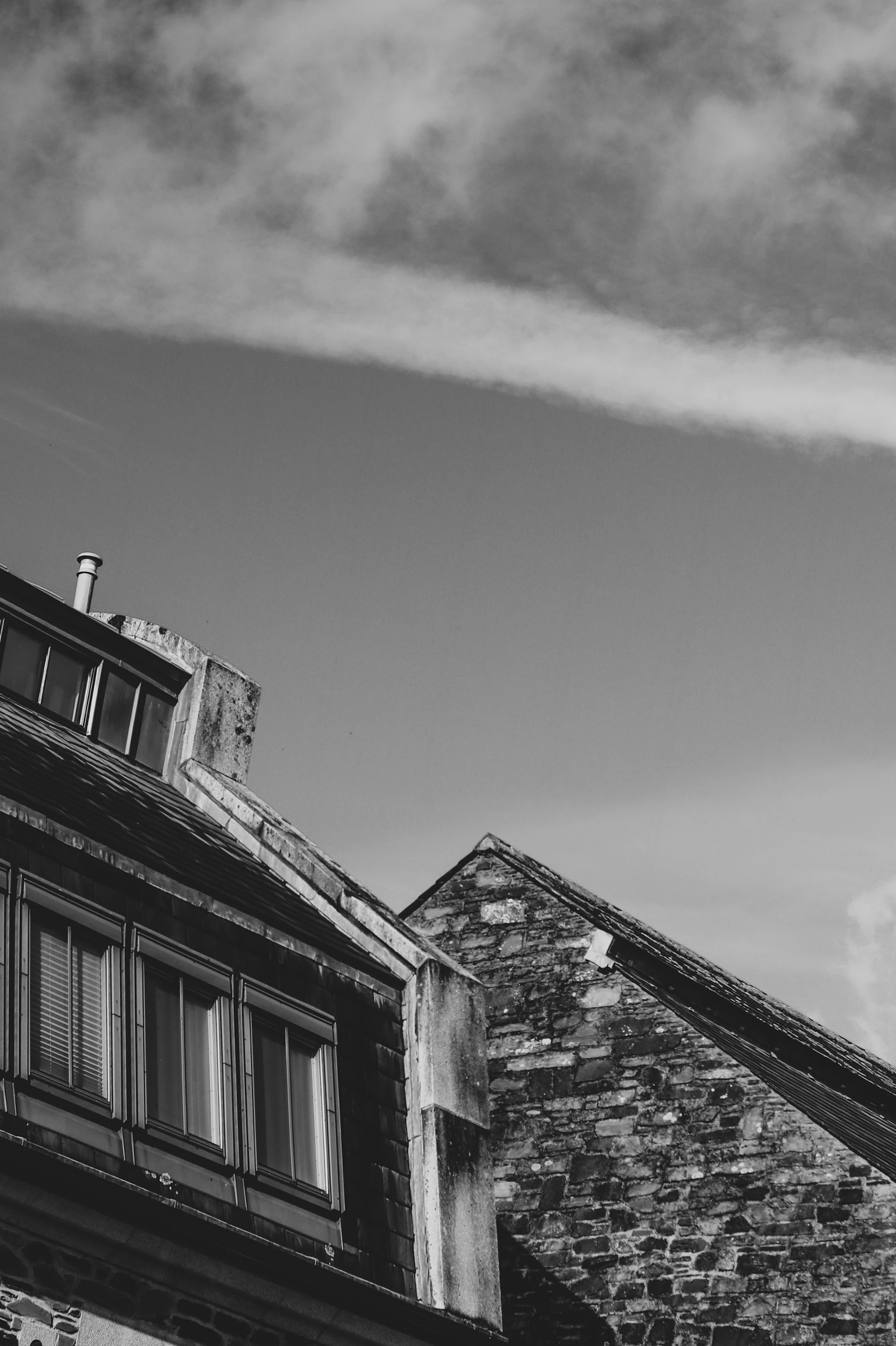 a building with a cloudy sky