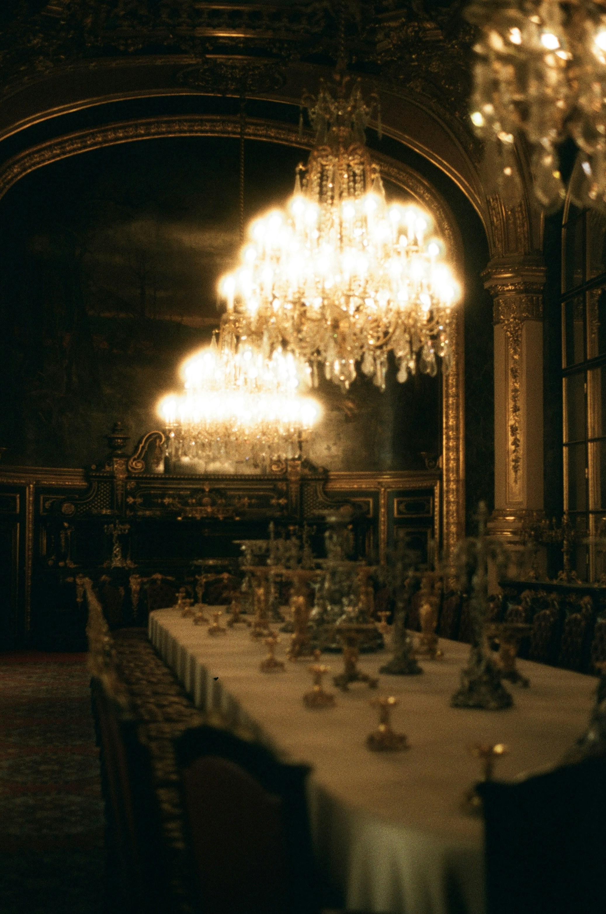 a large room with a chandelier and a large chandelier