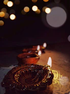 A warm family gathering around a traditional Kerala lamp during a festival.