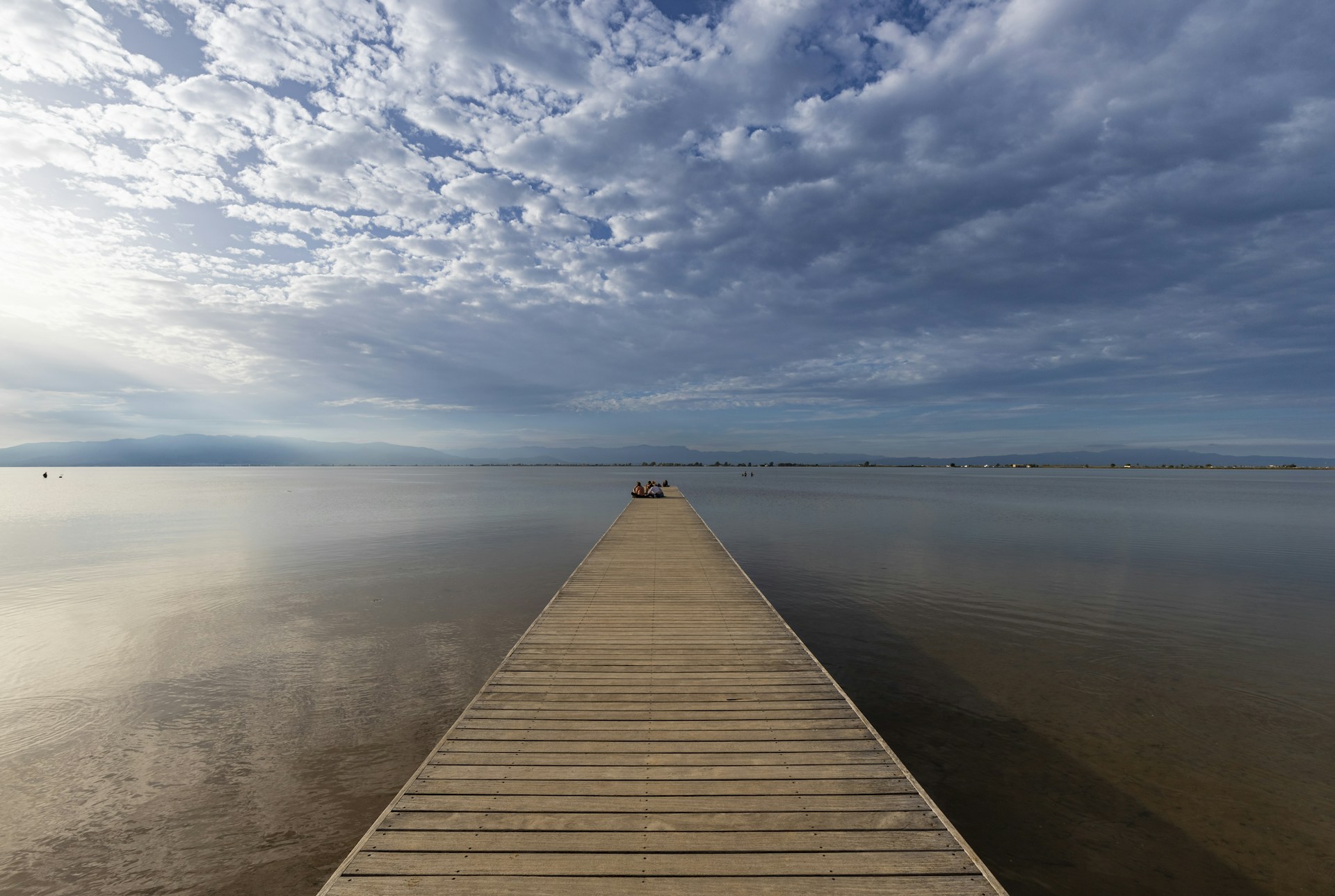 a dock leading out into the water
