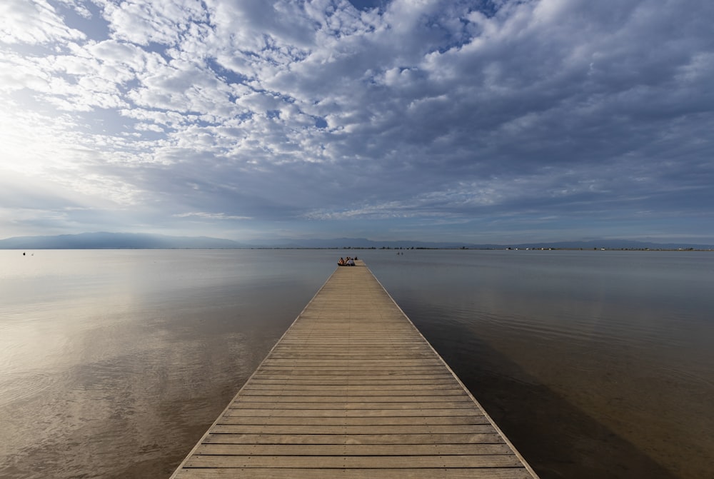 a dock leading out into the water