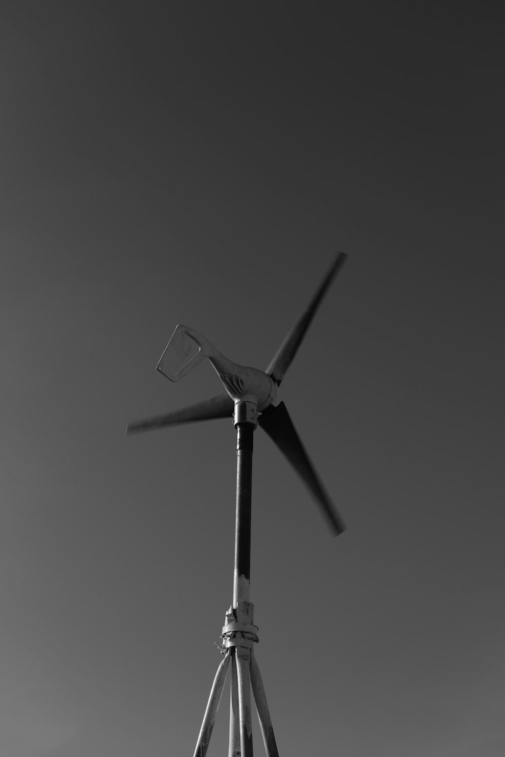 a windmill with a black background