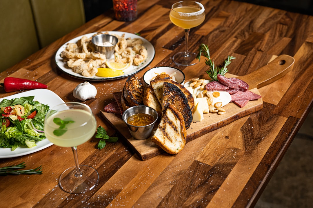 a table with food and drinks on it,