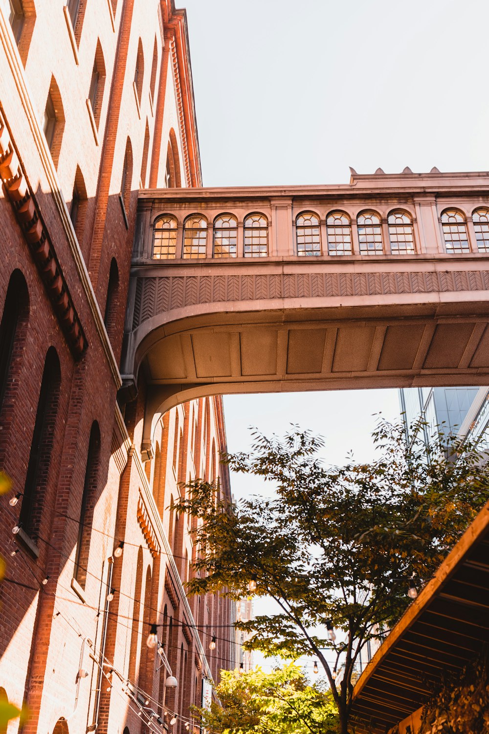 a bridge with a building in the background