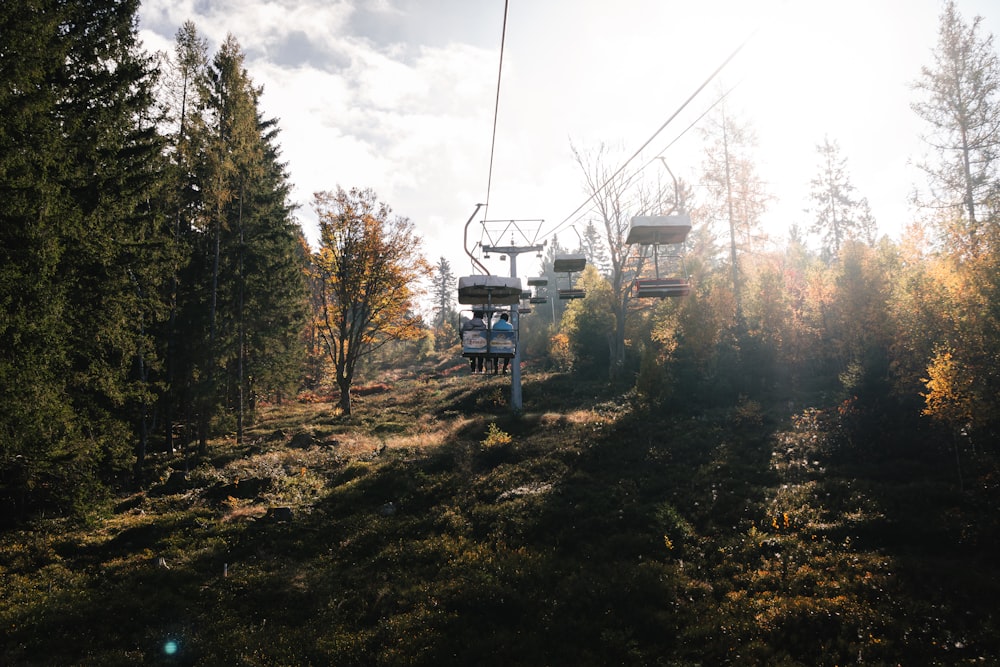 a ski lift going up a hill