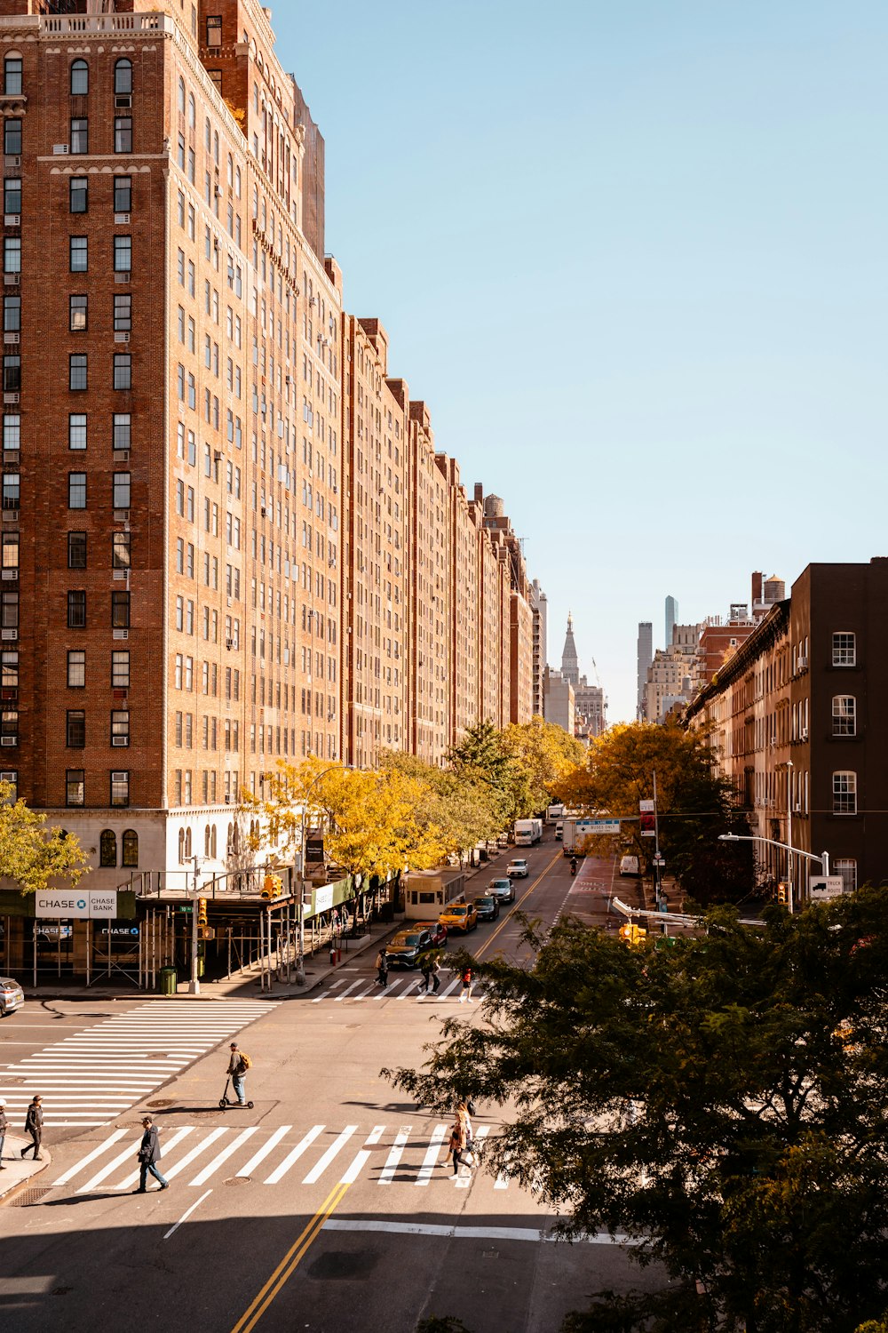 a street with cars and buildings on either side of it