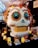 A large decorative skull with intricate designs stands on display, adorned with colorful flowers and feathers. Its eyes are detailed with bright blue and orange patterns, while the teeth are stylized in a golden hue. Surrounding the skull are decorative candles and smaller ornamental skulls, each housed in transparent boxes. The setting suggests a festive or celebratory theme.