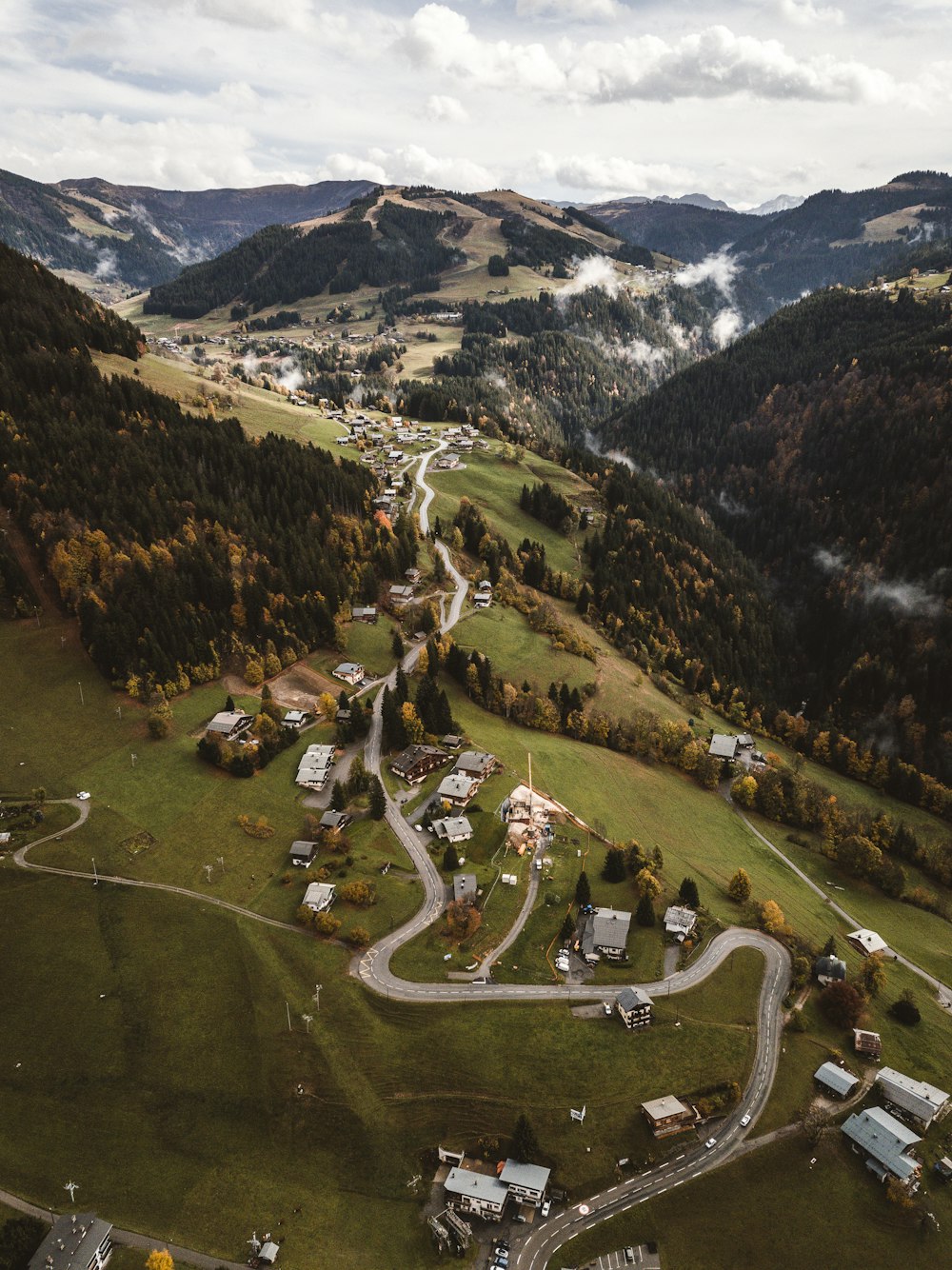 a landscape with buildings and trees