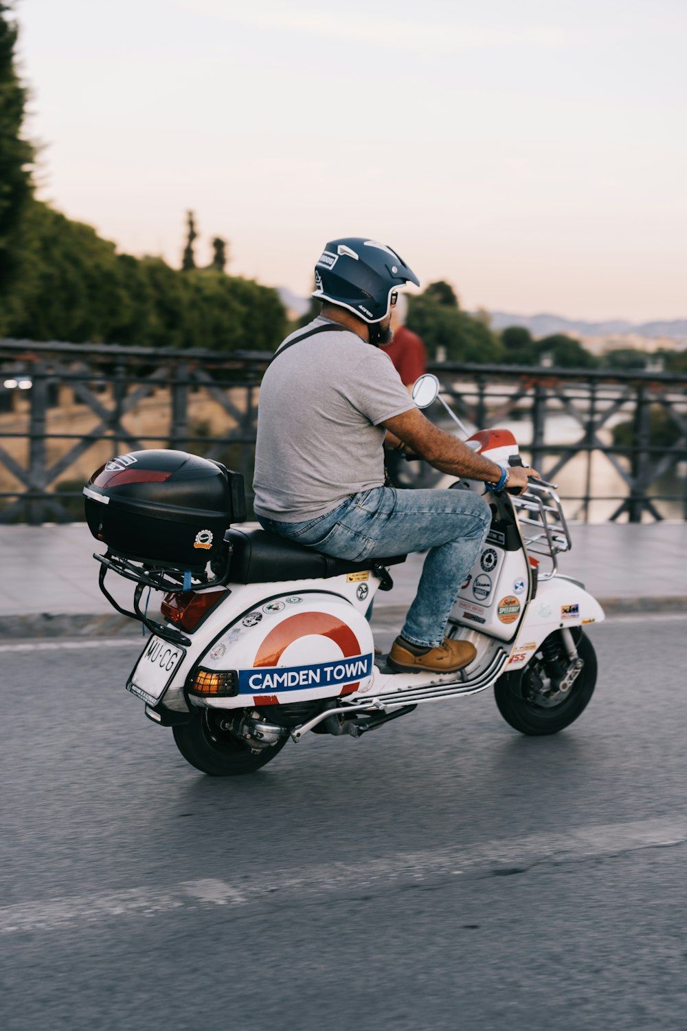 a man riding a scooter