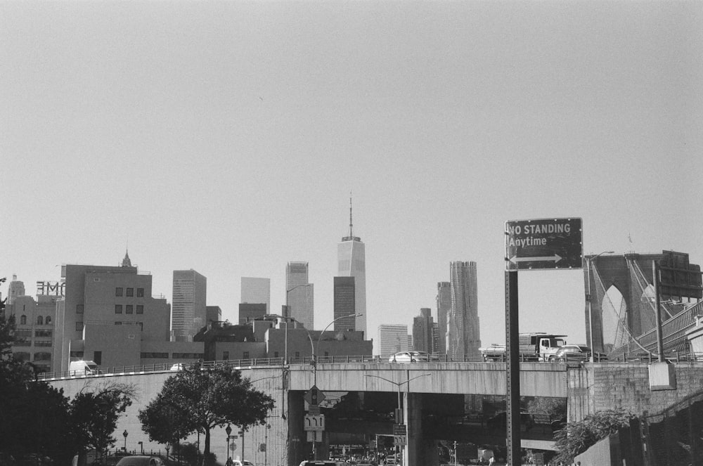 a city skyline with a bridge