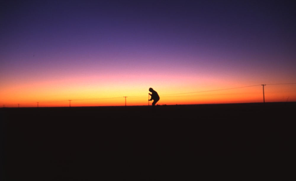 a person walking on a hill