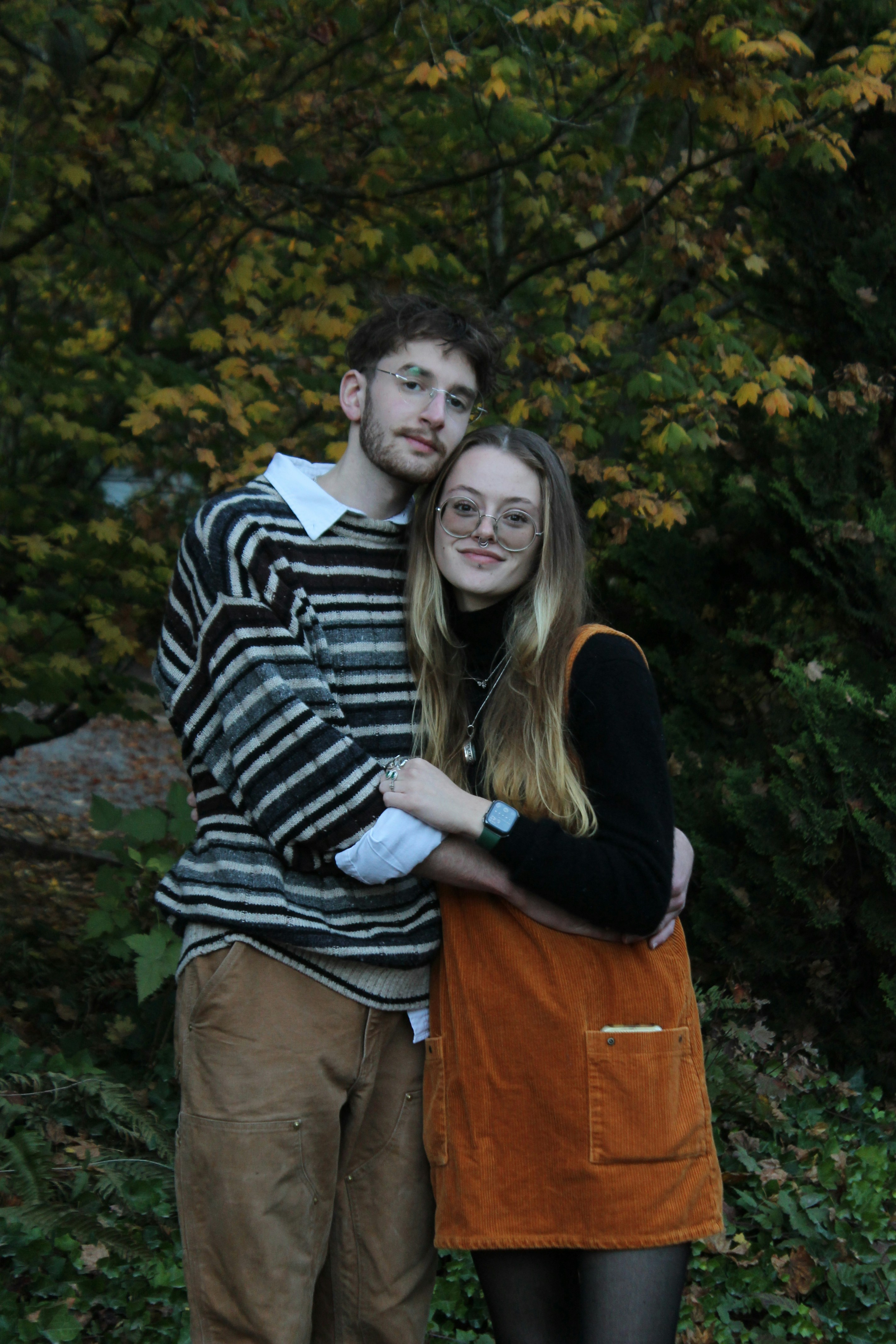a man and woman posing for a picture