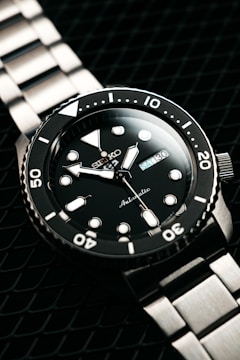 a black watch with white hands