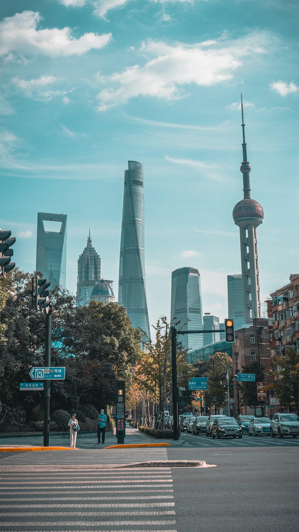 a city street with tall buildings