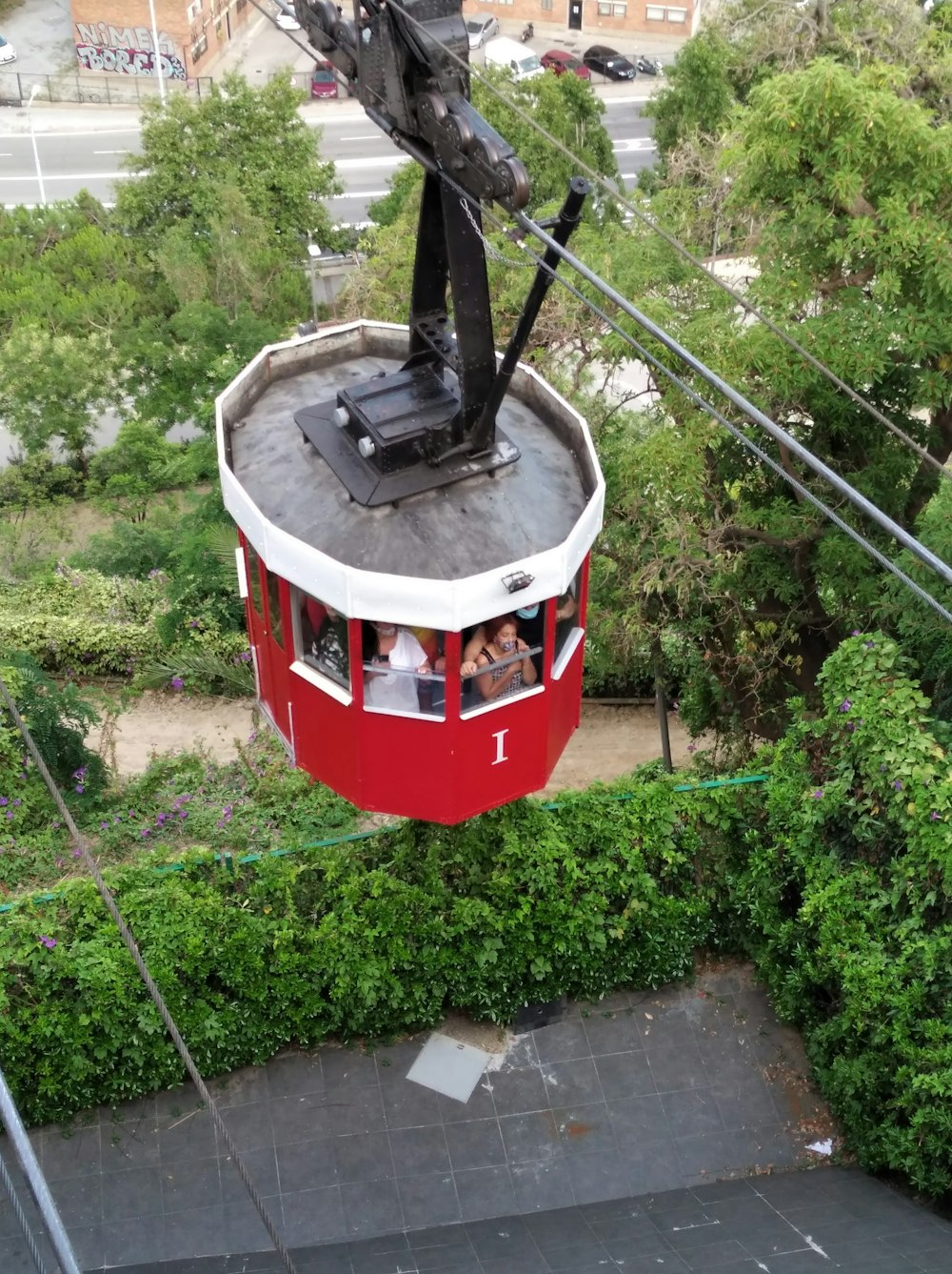 a cable car above a road