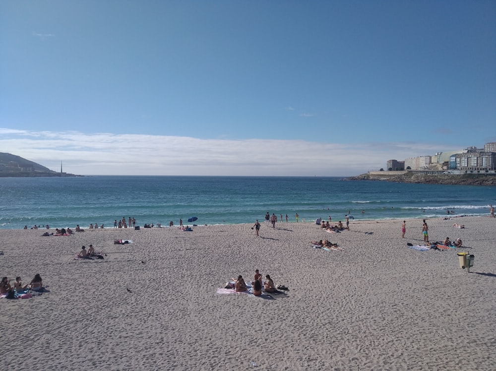 a group of people on a beach